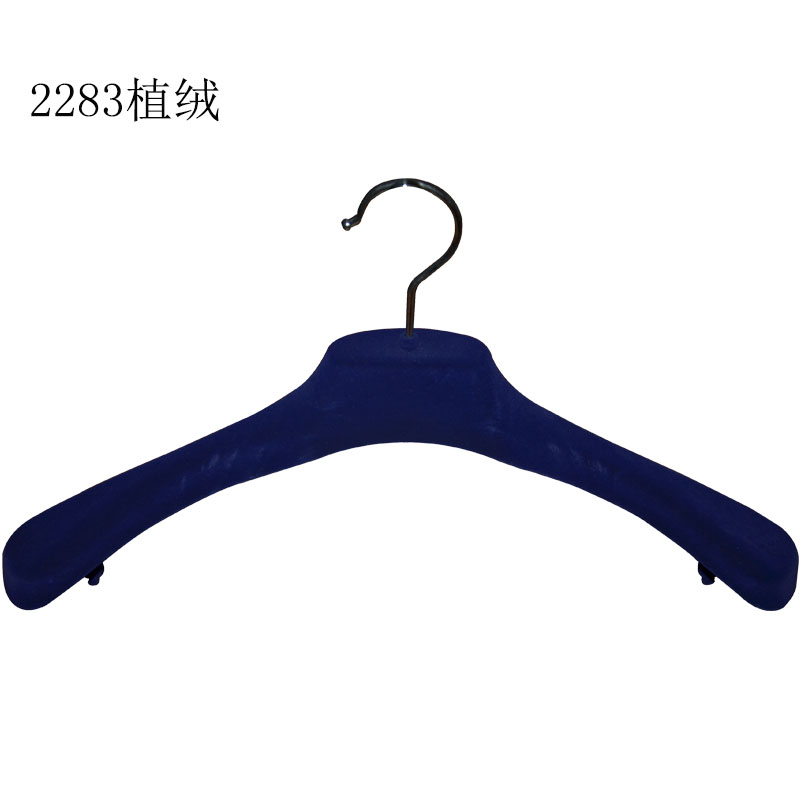 Luxury fashion stores plastic velvet hangers display branded clothes